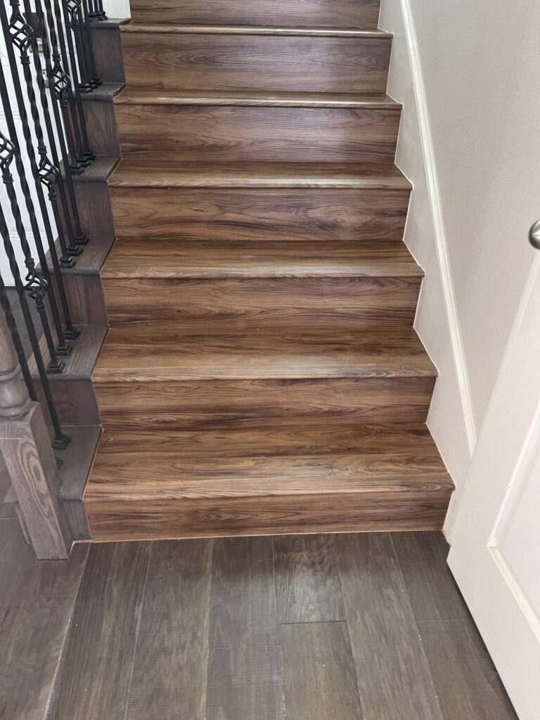 LVP with existing skirts reused on stairs